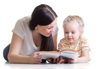 pretty young mother teaching her little kid child